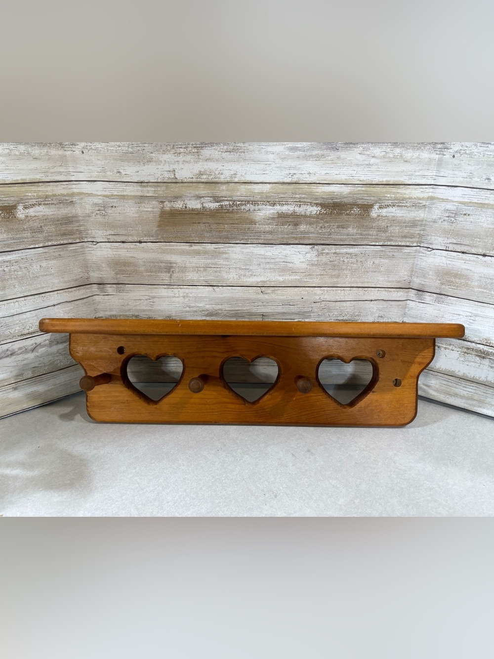 Vintage wood trinket shelf with heart cut outs
